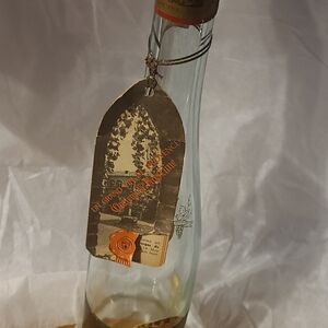 Elegant Glass Bottle with Tag